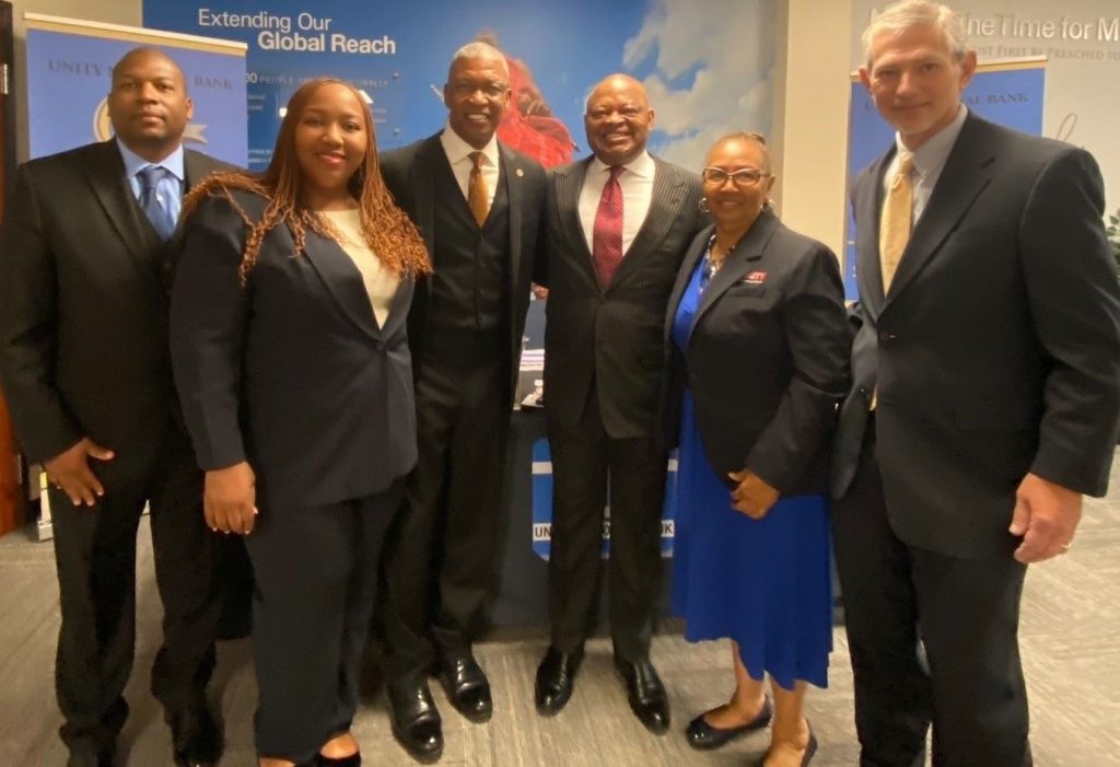 Bank staff and community partners at Covenant House of Texas Financial Literacy Workshop